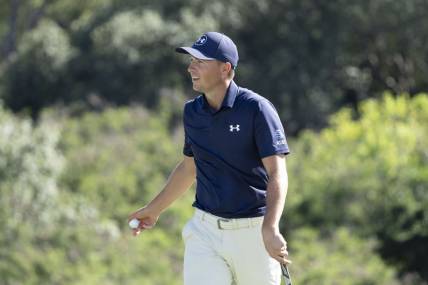 January 6, 2024; Maui, Hawaii, USA; Jordan Spieth smiles after making his putt on the 18th hole during the third round of The Sentry golf tournament at Kapalua Golf - The Plantation Course. Mandatory Credit: Kyle Terada-USA TODAY Sports