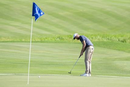 January 6, 2024; Maui, Hawaii, USA; Chris Kirk putts on the 18th hole during the third round of The Sentry golf tournament at Kapalua Golf - The Plantation Course. Mandatory Credit: Kyle Terada-USA TODAY Sports