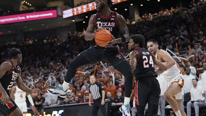 Jan 6, 2024; Austin, Texas, USA; Texas Tech Red Raiders guard Joe Toussaint (6) grabs a rebound during the first half against the Texas Longhorns at Moody Center. Mandatory Credit: Scott Wachter-USA TODAY Sports