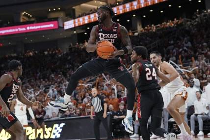 Jan 6, 2024; Austin, Texas, USA; Texas Tech Red Raiders guard Joe Toussaint (6) grabs a rebound during the first half against the Texas Longhorns at Moody Center. Mandatory Credit: Scott Wachter-USA TODAY Sports
