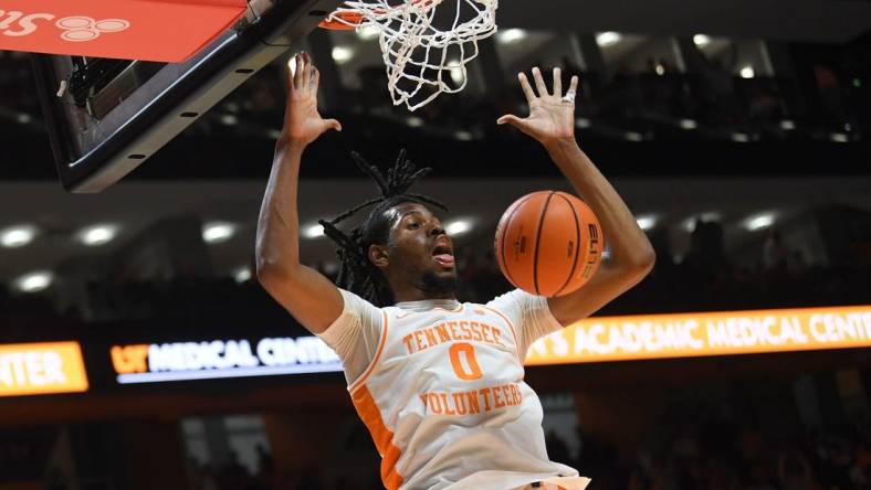 Tennessee forward Jonas Aidoo (0) dunks the ball during an NCAA basketball game against Ole Miss at Thompson-Boling Arena at Food City Center, Saturday, Jan. 6, 2024.