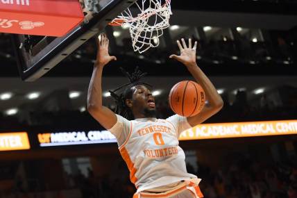Tennessee forward Jonas Aidoo (0) dunks the ball during an NCAA basketball game against Ole Miss at Thompson-Boling Arena at Food City Center, Saturday, Jan. 6, 2024.