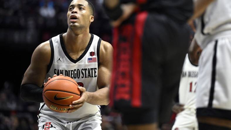 Jan 6, 2024; San Diego, California, USA; San Diego State Aztecs forward Jaedon LeDee (13) shoots a free throw during the second half against the UNLV Rebels at Viejas Arena. Mandatory Credit: Orlando Ramirez-USA TODAY Sports