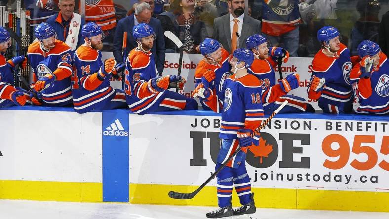 Jan 6, 2024; Edmonton, Alberta, CAN; Edmonton Oilers forward Zach Hyman (18) celebrates with teammates after scoring his  third goal of the game against the Ottawa Senators during the third period at Rogers Place. Mandatory Credit: Perry Nelson-USA TODAY Sports