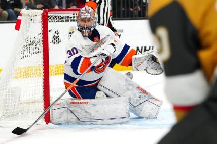 Jan 6, 2024; Las Vegas, Nevada, USA; New York Islanders goaltender Ilya Sorokin (30) recovers his stick while defending his net against the Vegas Golden Knights during the second period at T-Mobile Arena. Mandatory Credit: Stephen R. Sylvanie-USA TODAY Sports