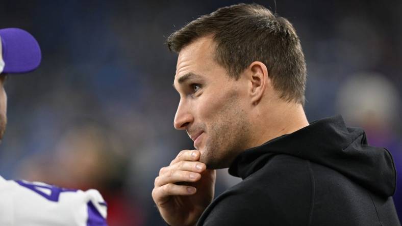 Jan 7, 2024; Detroit, Michigan, USA; Minnesota Vikings quarterback Kirk Cousins (8) talks with teammates prior to their game against the Detroit Lions at Ford Field. Mandatory Credit: Lon Horwedel-USA TODAY Sports