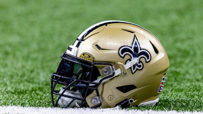 Jan 7, 2024; New Orleans, Louisiana, USA; Detailed view of the New Orleans Saints helmet during warmups against the Atlanta Falcons at Caesars Superdome. Mandatory Credit: Stephen Lew-USA TODAY Sports