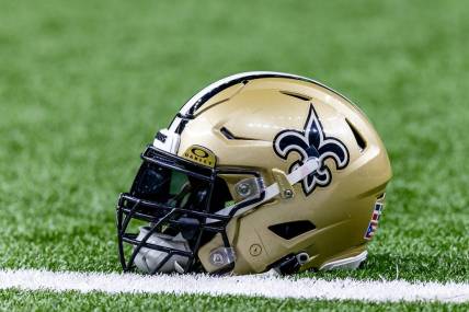 Jan 7, 2024; New Orleans, Louisiana, USA; Detailed view of the New Orleans Saints helmet during warmups against the Atlanta Falcons at Caesars Superdome. Mandatory Credit: Stephen Lew-USA TODAY Sports