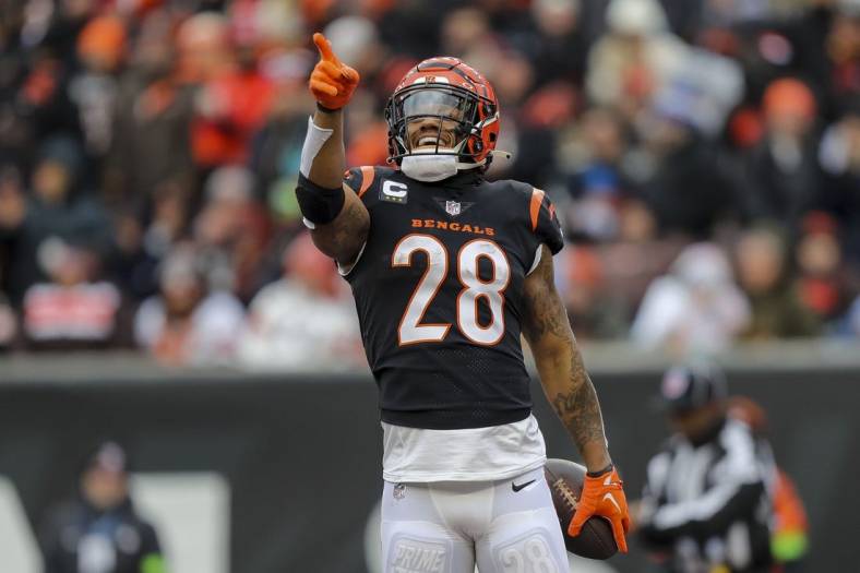 Jan 7, 2024; Cincinnati, Ohio, USA; Cincinnati Bengals running back Joe Mixon (28) reacts after scoring a touchdown against the Cleveland Browns in the first half at Paycor Stadium. Mandatory Credit: Katie Stratman-USA TODAY Sports