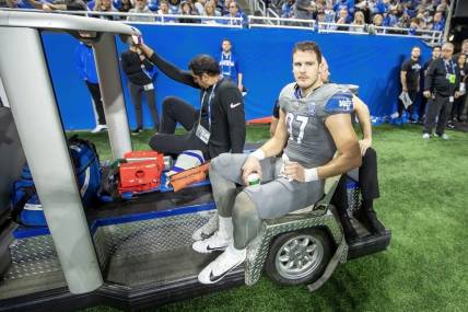 Jan 7, 2024; Detroit, Michigan, USA; Detroit Lions tight end Sam LaPorta (87) is carted off the field after an injury during second quarter of the game against the Minnesota Vikings at Ford Field. Mandatory Credit: David Reginek-USA TODAY Sports