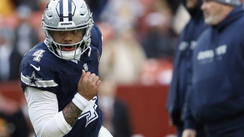 Cowboys quarterback Dak Prescott (4) participates in warmups prior to the game against the Washington Commanders at FedExField. Mandatory Credit: Geoff Burke-USA TODAY Sports