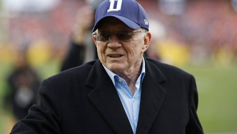 Jan 7, 2024; Landover, Maryland, USA; Dallas Cowboys owner Jerry Jones walks off the field after warmups prior to the game against the Washington Commanders at FedExField. Mandatory Credit: Geoff Burke-USA TODAY Sports