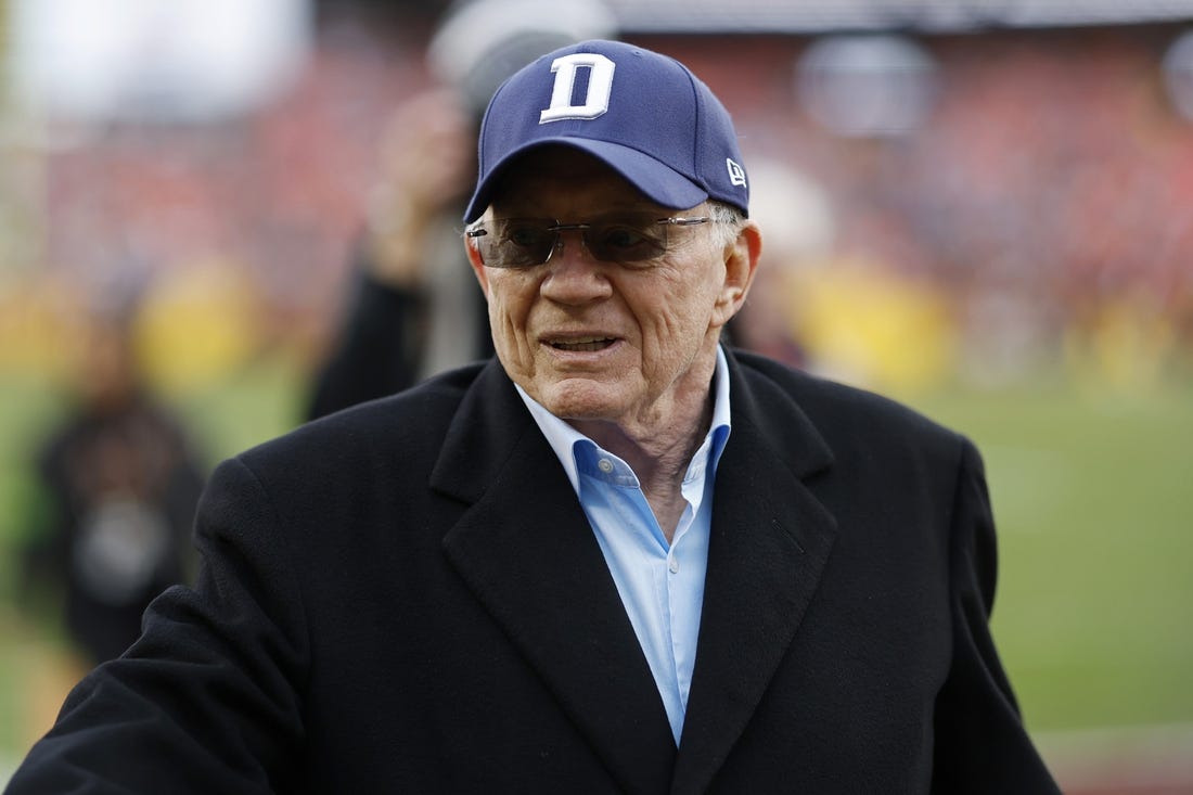 Jan 7, 2024; Landover, Maryland, USA; Dallas Cowboys owner Jerry Jones walks off the field after warmups prior to the game against the Washington Commanders at FedExField. Mandatory Credit: Geoff Burke-USA TODAY Sports