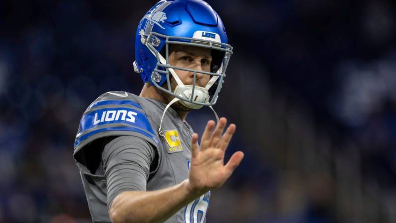 Detroit Lions quarterback Jared Goff waves during pregame warmups before the start of the game against the Minnesota Vikings at Ford Field in Detroit on Sunday, Jan. 7, 2024.