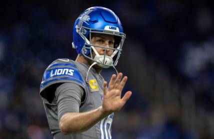 Detroit Lions quarterback Jared Goff waves during pregame warmups before the start of the game against the Minnesota Vikings at Ford Field in Detroit on Sunday, Jan. 7, 2024.