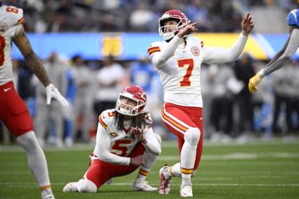 Jan 7, 2024; Inglewood, California, USA; Kansas City Chiefs place kicker Harrison Butker (7) watches his field goal against the Los Angeles Chargers during the first half at SoFi Stadium. Mandatory Credit: Orlando Ramirez-USA TODAY Sports