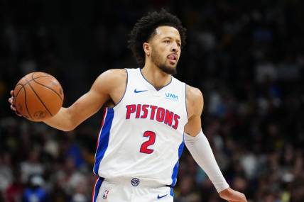 Jan 7, 2024; Denver, Colorado, USA; Detroit Pistons guard Cade Cunningham (2) controls the ball during the first quarter against the Denver Nuggets at Ball Arena. Mandatory Credit: Ron Chenoy-USA TODAY Sports