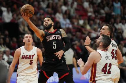 Jan 8, 2024; Miami, Florida, USA;  Houston Rockets guard Fred VanVleet (5) goes up for a shot against the Miami Heat during the second half at Kaseya Center. Mandatory Credit: Jim Rassol-USA TODAY Sports