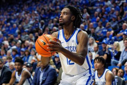 Jan 9, 2024; Lexington, Kentucky, USA; Kentucky Wildcats guard Antonio Reeves (12) shoots the ball during the second half against the Missouri Tigers at Rupp Arena at Central Bank Center. Mandatory Credit: Jordan Prather-USA TODAY Sports