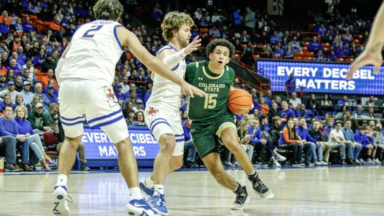 Jan 9, 2024; Boise, Idaho, USA; Colorado State Rams guard Jalen Lake (15) drives the ball against against the Boise State Broncos during the first half at ExtraMile Arena. Mandatory Credit: Brian Losness-USA TODAY Sports