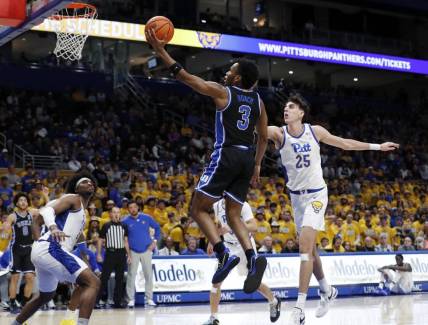 Jan 9, 2024; Pittsburgh, Pennsylvania, USA;  Duke Blue Devils guard Jeremy Roach (3) goes to the basket past Pittsburgh Panthers forward Guillermo Diaz Graham (25) during the first half at the Petersen Events Center. Mandatory Credit: Charles LeClaire-USA TODAY Sports