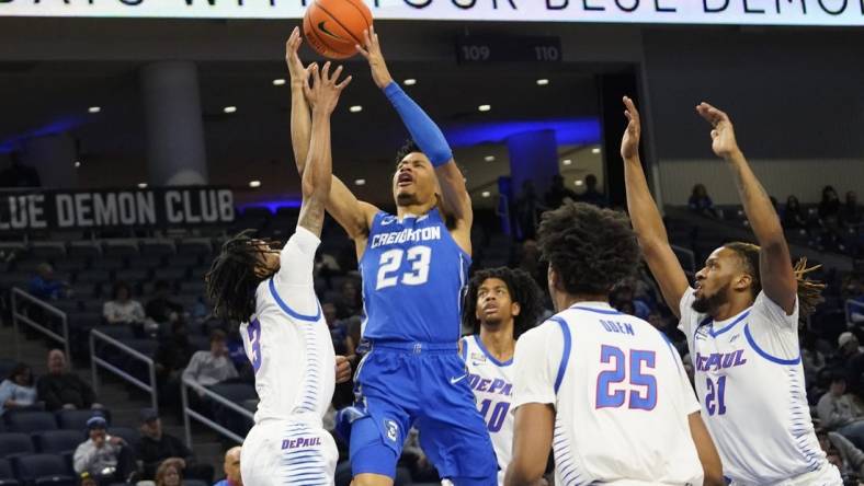 Jan 9, 2024; Chicago, Illinois, USA; DePaul Blue Demons guard Jalen Terry (3) defends Creighton Bluejays guard Trey Alexander (23) during the first half at Wintrust Arena. Mandatory Credit: David Banks-USA TODAY Sports