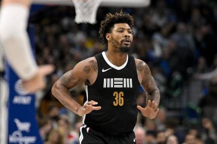 Jan 9, 2024; Dallas, Texas, USA; Memphis Grizzlies guard Marcus Smart (36) celebrates after he makes a three point shot against the Dallas Mavericks during the second half at the American Airlines Center. Mandatory Credit: Jerome Miron-USA TODAY Sports