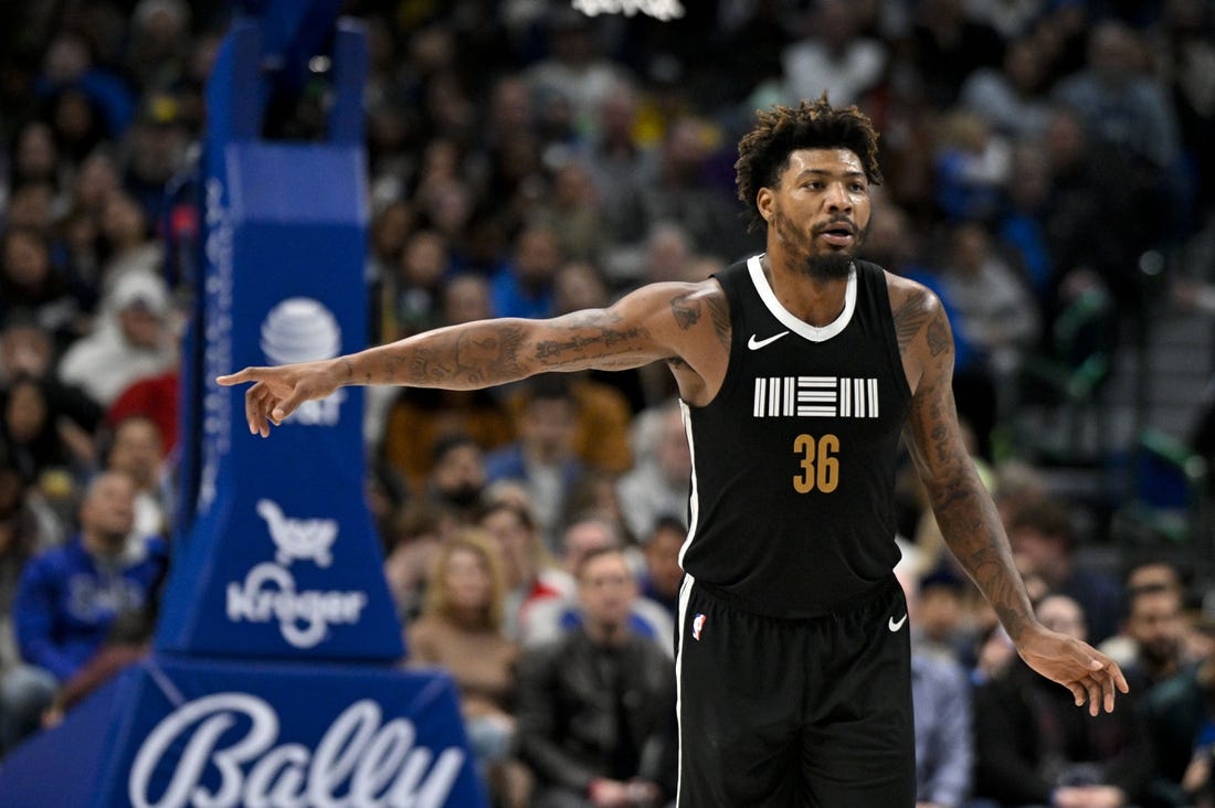 Jan 9, 2024; Dallas, Texas, USA; Memphis Grizzlies guard Marcus Smart (36) celebrates after he makes a three point shot against the Dallas Mavericks during the second half at the American Airlines Center. Mandatory Credit: Jerome Miron-USA TODAY Sports