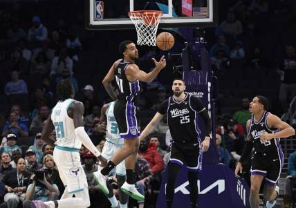 Jan 10, 2024; Charlotte, North Carolina, USA; Sacramento Kings forward Trey Lyles (41) gets a rebound during the first half against the Charlotte Hornets at the Spectrum Center. Mandatory Credit: Sam Sharpe-USA TODAY Sports