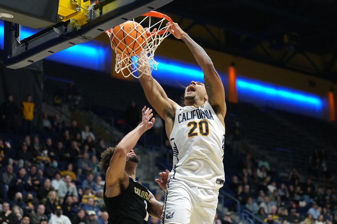 Jan 10, 2024; Berkeley, California, USA; California Golden Bears guard Jaylon Tyson (20) dunks against Colorado Buffaloes guard J'Vonne Hadley (1) during the second half at Haas Pavilion. Mandatory Credit: Darren Yamashita-USA TODAY Sports