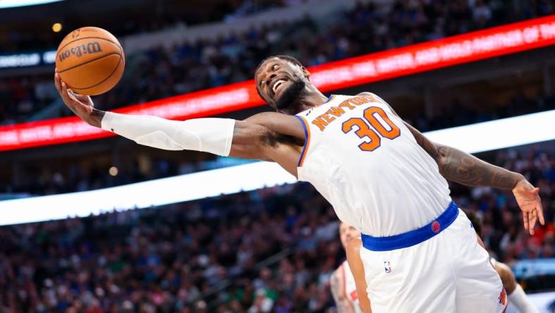 Jan 11, 2024; Dallas, Texas, USA;  New York Knicks forward Julius Randle (30) grabs a rebound during the first half against the Dallas Mavericks at American Airlines Center. Mandatory Credit: Kevin Jairaj-USA TODAY Sports