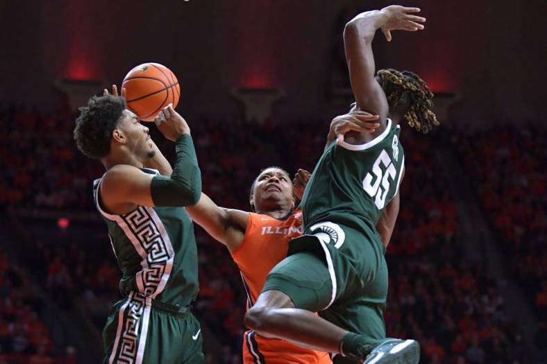 Jan 11, 2024; Champaign, Illinois, USA;  Illinois Fighting Illini guard Justin Harmon (4) drives to the basket during the first half against the Michigan State Spartans at State Farm Center. Mandatory Credit: Ron Johnson-USA TODAY Sports