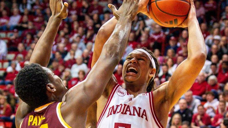 Indiana's Malik Reneau (5) shoots over Minnesota's Pharrel Payne (21) during the Indiana versus Minnesota men's basketball game at Simon Skjodt Assembly Hall on Friday, Jan. 12, 2024.