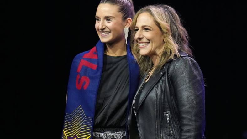 Jan 12, 2024; Anaheim, California, USA; University of North Carolina player Ally Sentnor (left) poses with NWSL commissioner Jessica Berman (right) after being selected by Utah Royals FC during the 2024 NWSL Draft at Anaheim Convention Center. Mandatory Credit: Kirby Lee-USA TODAY Sports