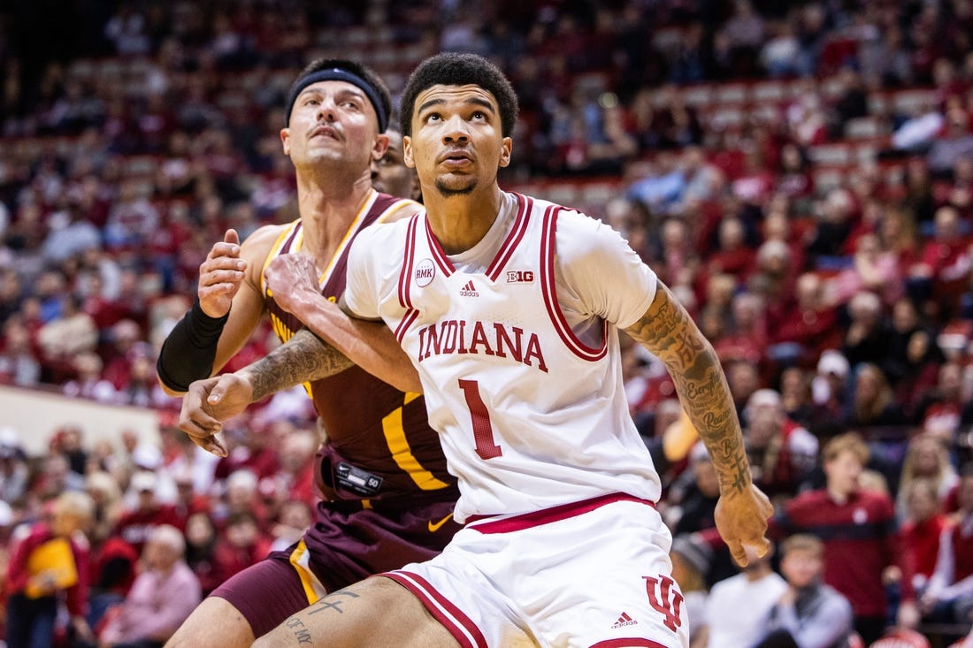 Jan 12, 2024; Bloomington, Indiana, USA; Indiana Hoosiers center Kel'el Ware (1) boxes out Minnesota Golden Gophers forward Dawson Garcia (3) in the second half at Simon Skjodt Assembly Hall. Mandatory Credit: Trevor Ruszkowski-USA TODAY Sports