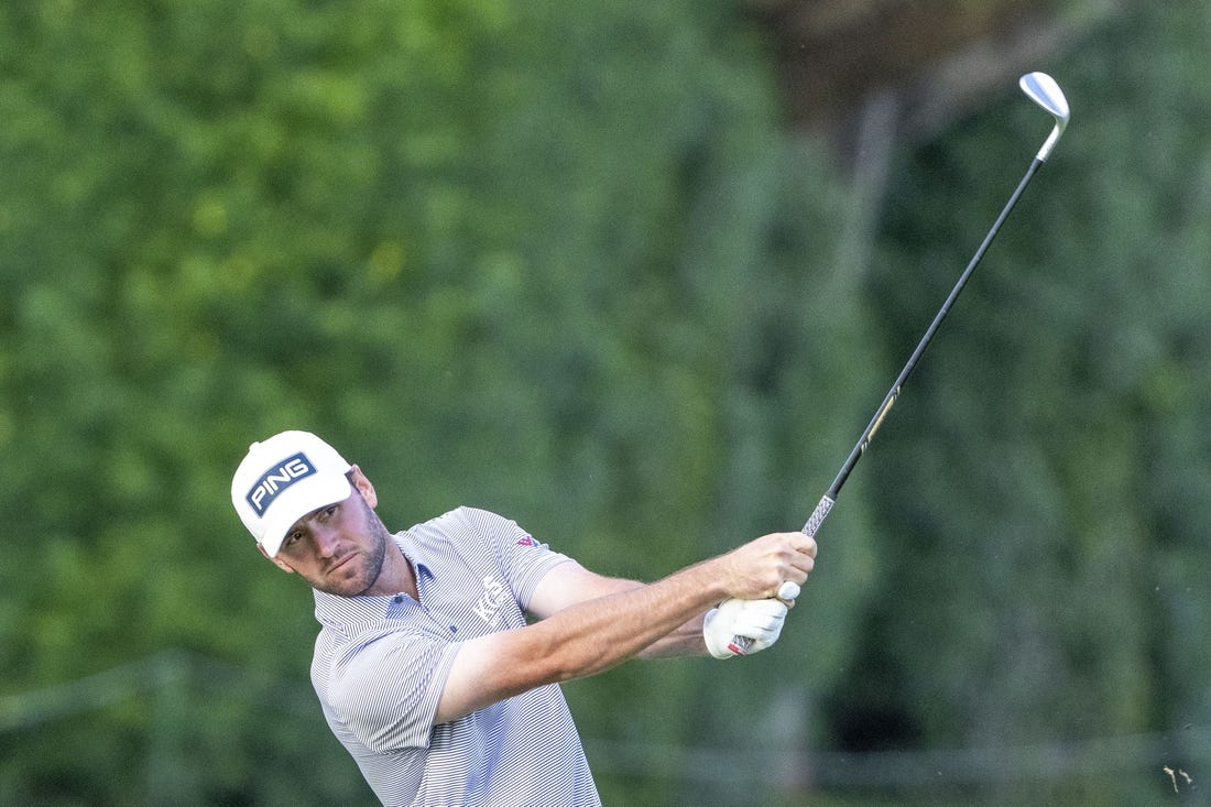 January 12, 2024; Honolulu, Hawaii, USA; Austin Eckroat hits his fairway shot on the eighth hole during the second round of the Sony Open in Hawaii golf tournament at Waialae Country Club. Mandatory Credit: Kyle Terada-USA TODAY Sports