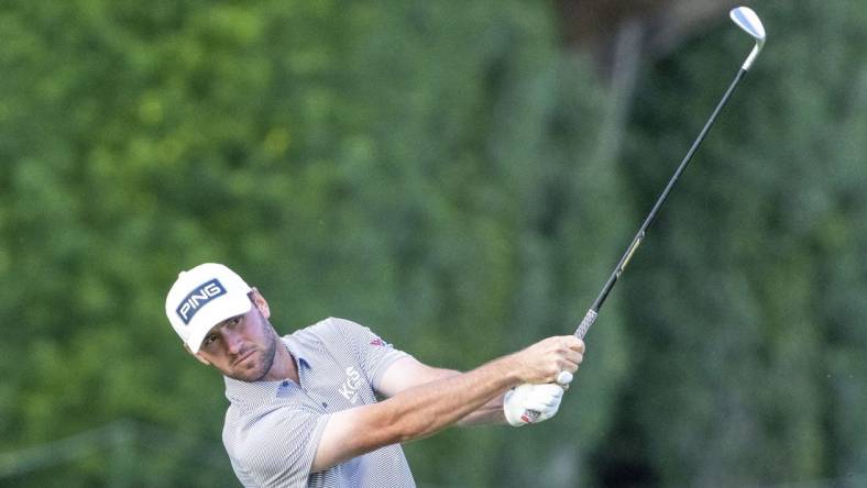 January 12, 2024; Honolulu, Hawaii, USA; Austin Eckroat hits his fairway shot on the eighth hole during the second round of the Sony Open in Hawaii golf tournament at Waialae Country Club. Mandatory Credit: Kyle Terada-USA TODAY Sports