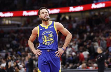 Jan 12, 2024; Chicago, Illinois, USA; Golden State Warriors guard Stephen Curry (30) reacts after a play during the second half against the Chicago Bulls at United Center. Mandatory Credit: Kamil Krzaczynski-USA TODAY Sports
