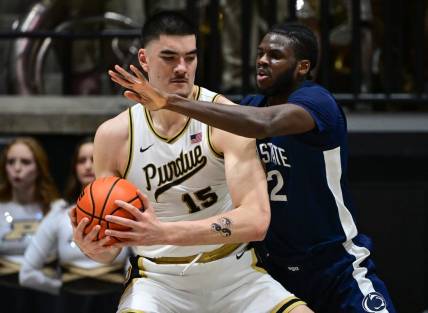 Jan 13, 2024; West Lafayette, Indiana, USA; Purdue Boilermakers center Zach Edey (15) controls the ball against Penn State Nittany Lions forward Qudus Wahab (22) during the first half at Mackey Arena. Mandatory Credit: Marc Lebryk-USA TODAY Sports