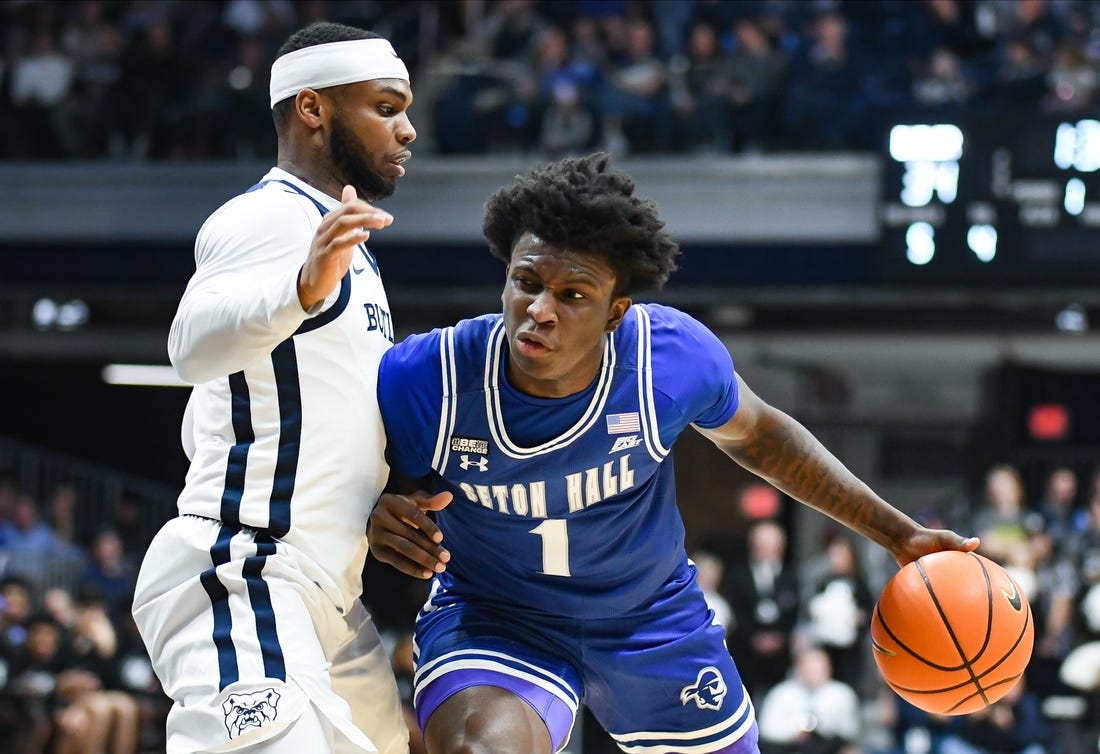 Jan 13, 2024; Indianapolis, Indiana, USA;  Seton Hall Pirates guard Kadary Richmond (1) dribbles the ball against Butler Bulldogs guard Posh Alexander (left) during the first half at Hinkle Fieldhouse. Mandatory Credit: Robert Goddin-USA TODAY Sports