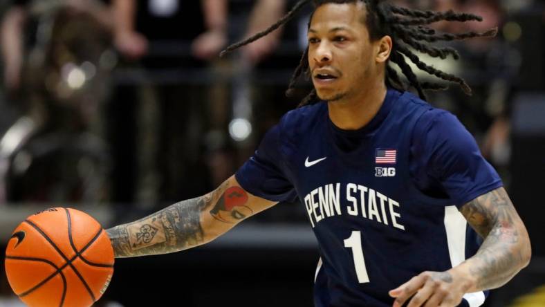 Penn State Nittany Lions guard Ace Baldwin Jr. (1) drives to the basket during the NCAA men   s basketball game against the Purdue Boilermakers, Saturday, Jan. 13, 2024, at Mackey Arena in West Lafayette, Ind.