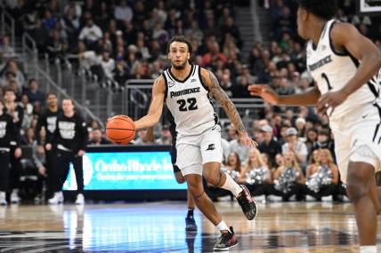 Jan 13, 2024; Providence, Rhode Island, USA; Providence Friars guard Devin Carter (22) passes the ball against the Xavier Musketeers during the first half at Amica Mutual Pavilion. Mandatory Credit:Eric Canha-USA TODAY Sports