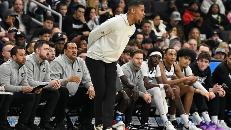 Jan 13, 2024; Providence, Rhode Island, USA; Providence Friars head coach Kim English reacts during the first half against the Xavier Musketeers at Amica Mutual Pavilion. Mandatory Credit:Eric Canha-USA TODAY Sports