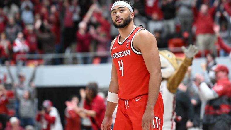 Jan 13, 2024; Pullman, Washington, USA; Arizona Wildcats guard Kylan Boswell (4) looks up at the score board after a game against the Washington State Cougars at Friel Court at Beasley Coliseum. Washington State won 73-70. Mandatory Credit: James Snook-USA TODAY Sports