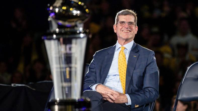 Michigan head coach Jim Harbaugh looks on during the national championship celebration at Crisler Center in Ann Arbor on Saturday, Jan. 13, 2024.