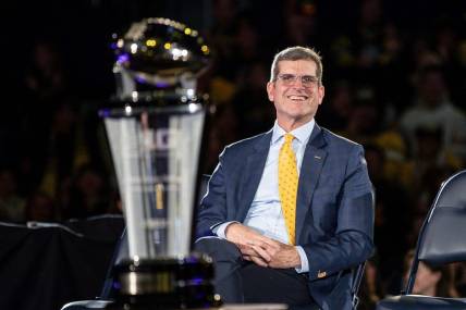 Michigan head coach Jim Harbaugh looks on during the national championship celebration at Crisler Center in Ann Arbor on Saturday, Jan. 13, 2024.