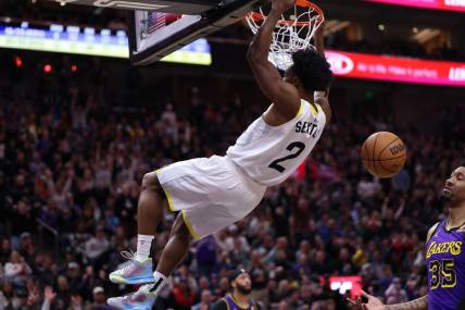 Jan 13, 2024; Salt Lake City, Utah, USA; Utah Jazz guard Collin Sexton (2) dunks the ball against the Los Angeles Lakers during the fourth quarter at Delta Center. Mandatory Credit: Rob Gray-USA TODAY Sports