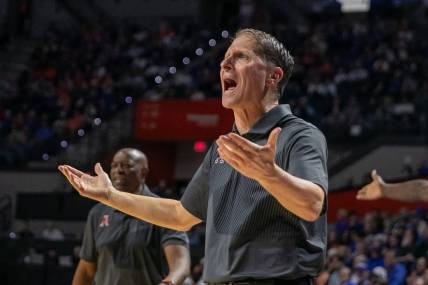 Arkansas head coach Eric Musselman protests a call during the first half of an NCAA basketball game against Florida in Gainesville, FL on Saturday, January 13, 2024. [Alan Youngblood/Gainesville Sun]
