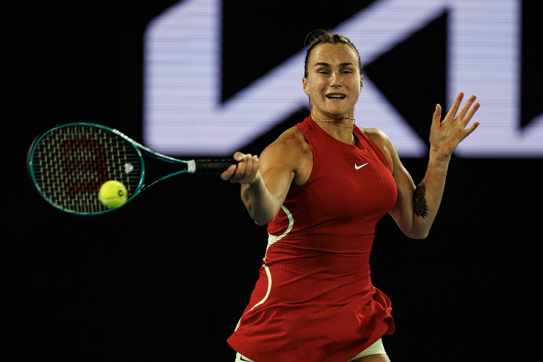 Jan 14, 2024; Melbourne, Victoria, Australia;  Aryna Sabalenka of Russia hits a shot at the Australian Open. Mandatory Credit: Mike Frey-USA TODAY Sports