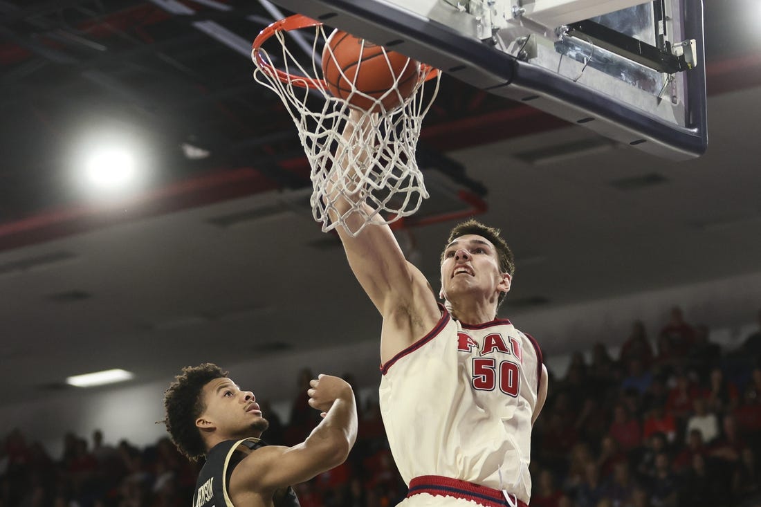 Jan 14, 2024; Boca Raton, Florida, USA; Florida Atlantic Owls center Vladislav Goldin (50) dunks the basketball against the UAB Blazers during the second half at Eleanor R. Baldwin Arena. Mandatory Credit: Sam Navarro-USA TODAY Sports